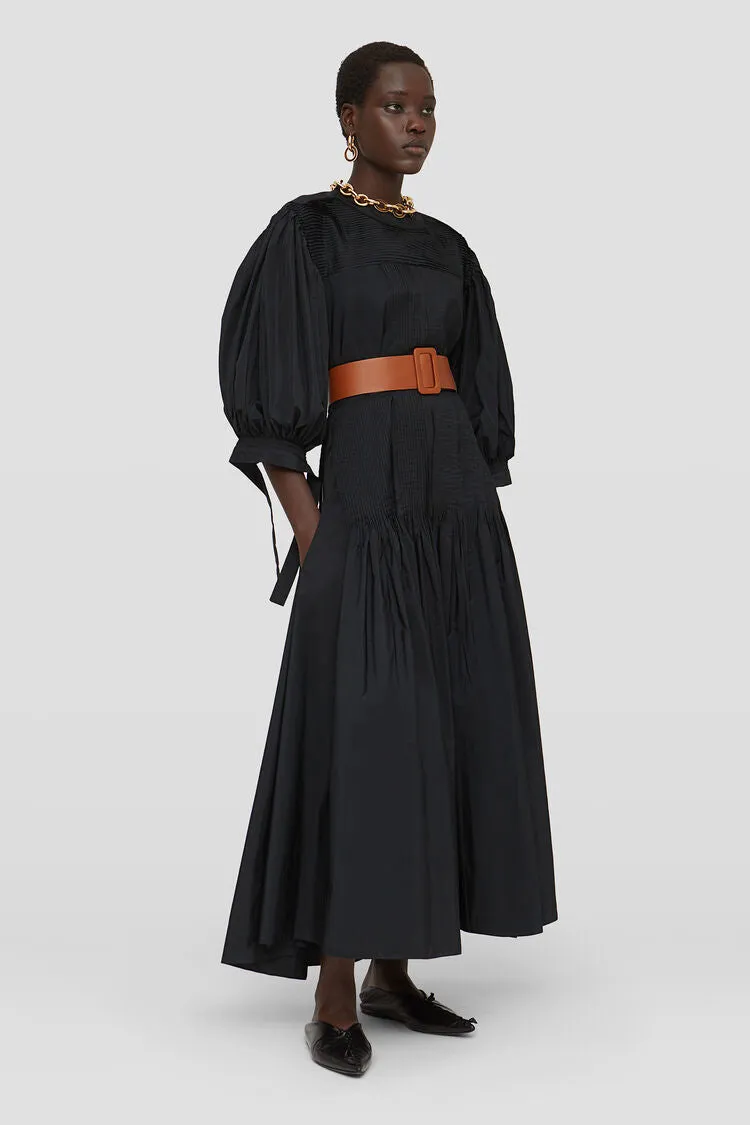 Long dress with pintucks on shoulders and skirt
