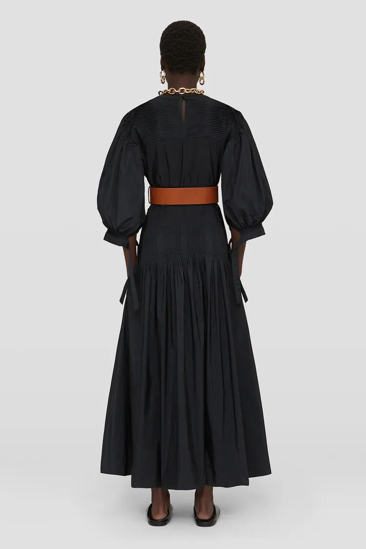 Long dress with pintucks on shoulders and skirt