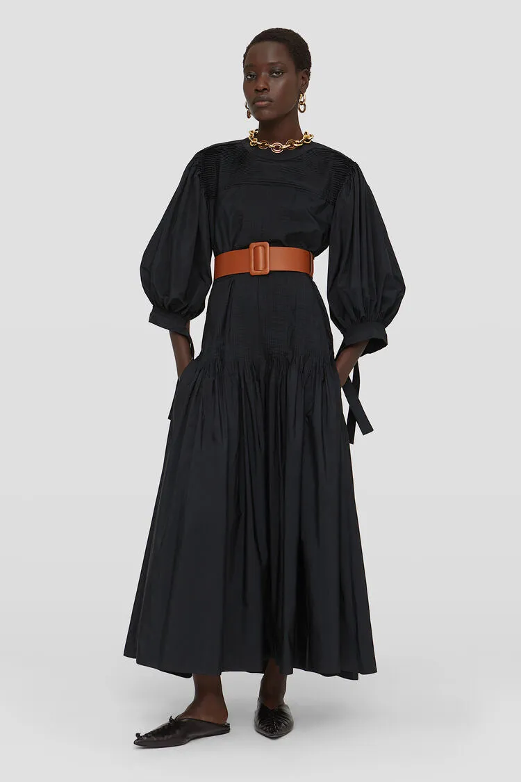 Long dress with pintucks on shoulders and skirt