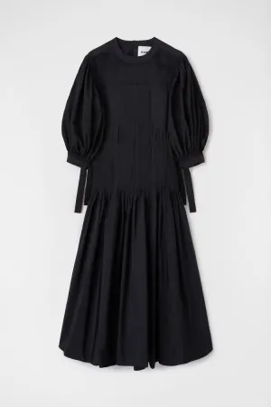 Long dress with pintucks on shoulders and skirt