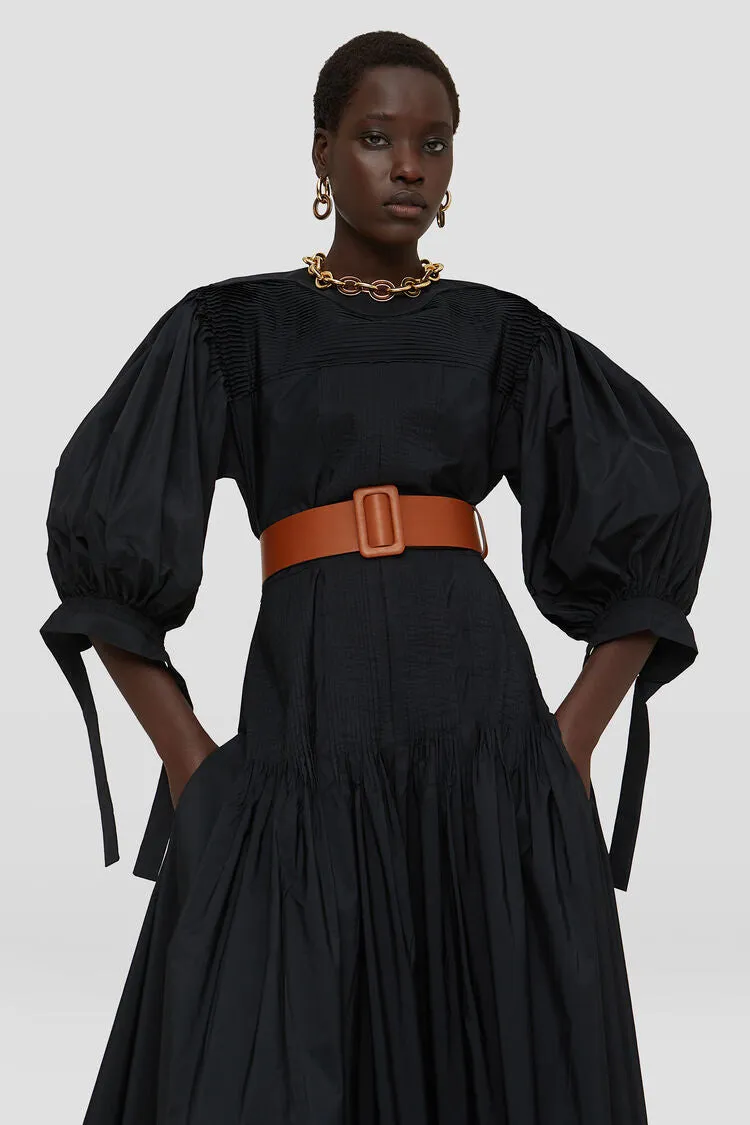 Long dress with pintucks on shoulders and skirt