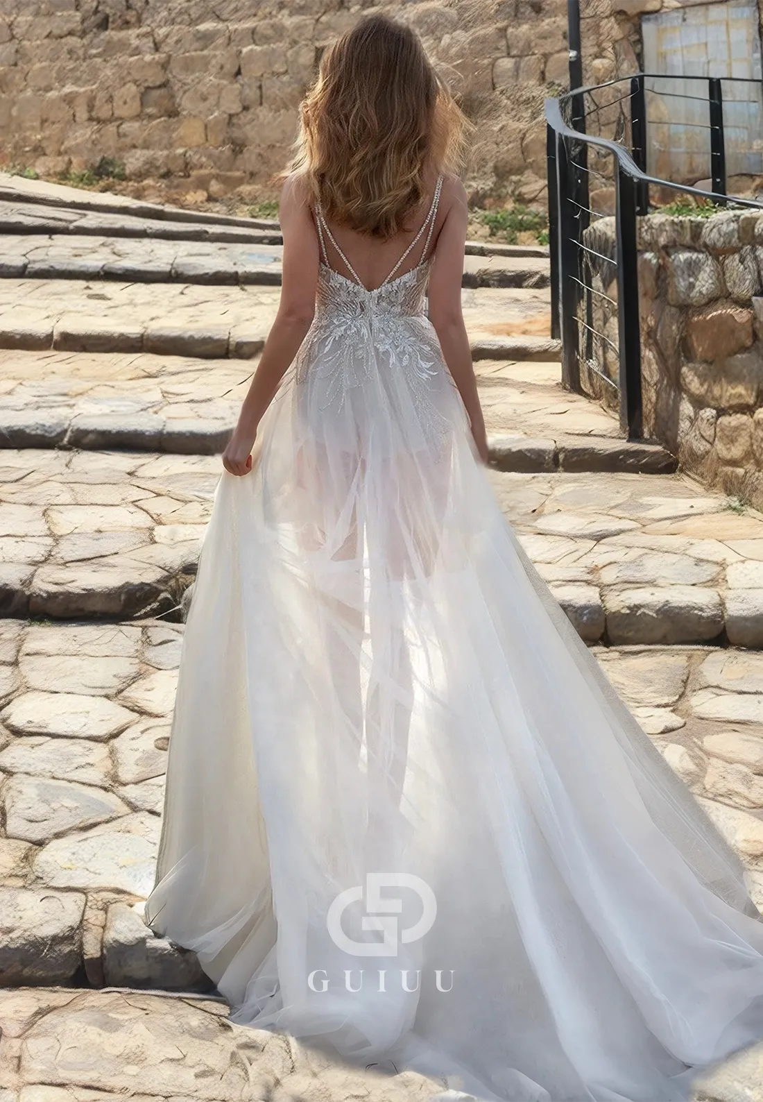 Tulle A-Line Sleeveless Beaded Wedding Dress with Lace Appliques and Spaghetti Straps